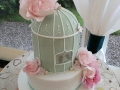 Bird cage cake with sugar roses