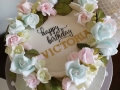 flowering ring birthday cake with pearl beaded base detail