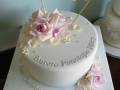 One tier Christening cake with sugar flowers and bunting detail