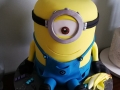 Minion cake with monster minion birthday hat and banana