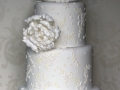 Lace-and-polka-pearl-wedding-cake